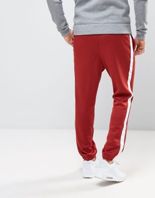 nike tribute joggers red