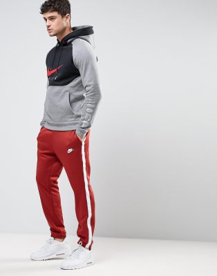 grey and red nike joggers