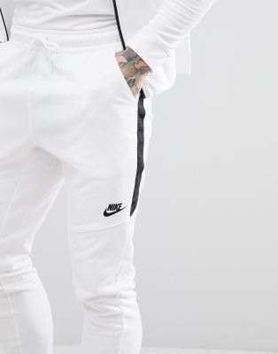 nike tribute track pants white