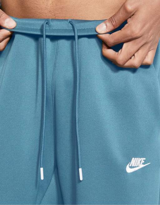 Nike tribute outlet joggers in green