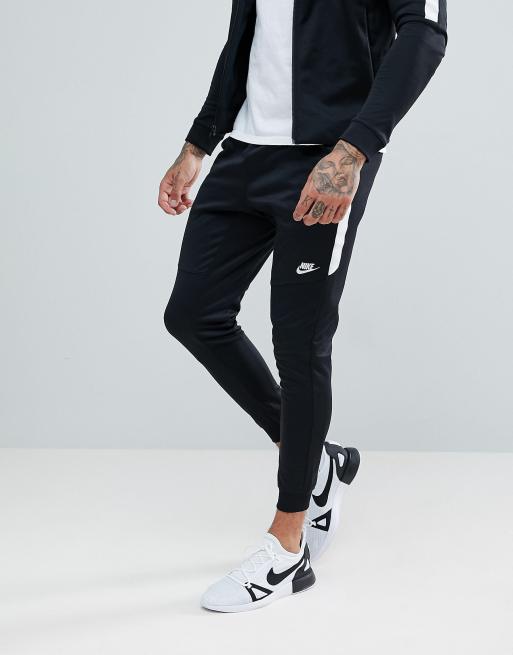 Nike tribute poly store tracksuit in black