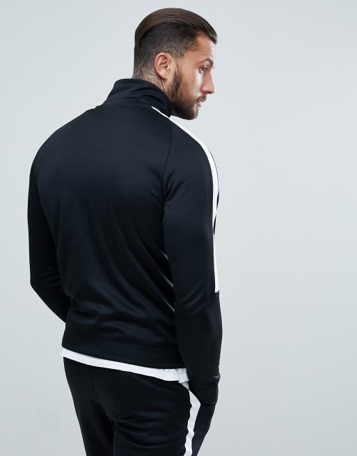 Nike tribute poly store track jacket in black