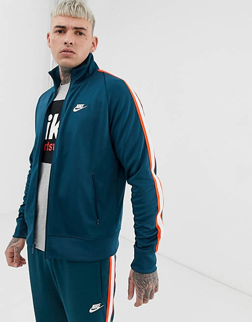 mosterd pistool vrachtauto Nike Tribute Track Top in green | ASOS
