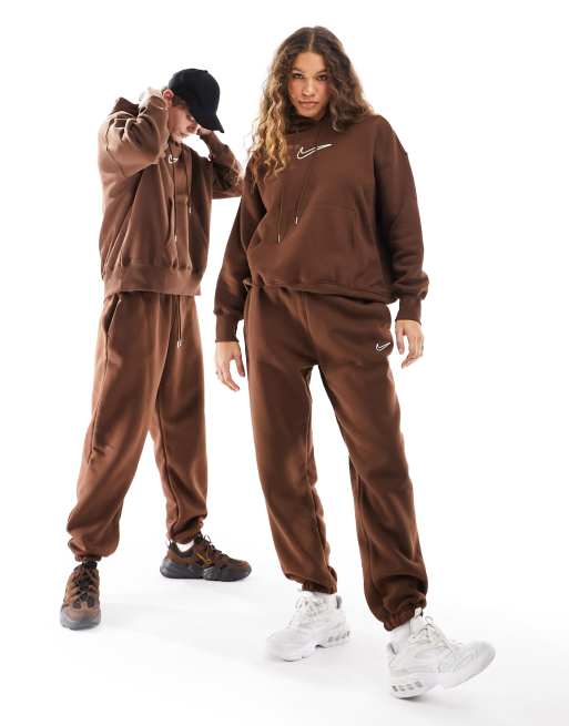 Nike - Uniseks joggingbroek met midi-swoosh in cacaobruin