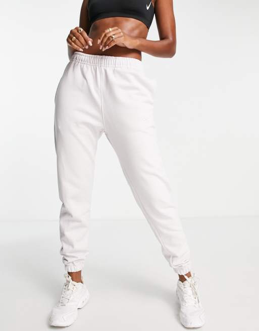 Nike unisex cuffed fleece joggers in venice lilac ASOS