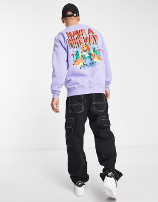 Nike unisex fleece graphic crew neck sweat in light thistle - ASOS Price Checker