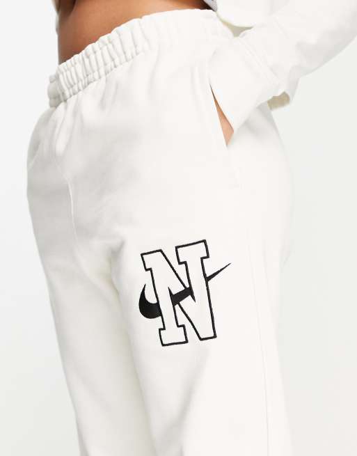 Nike Unisex - Joggers oversize in pile bianco sporco con logo vintage, 3 di 4