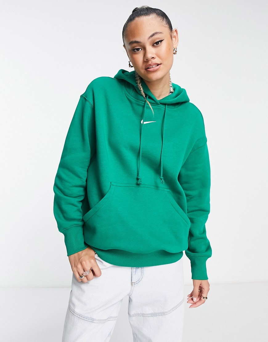 Nike unisex mini swoosh oversized pullover hoodie in malachite green