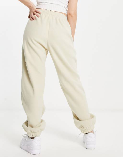 Nike Mini Swoosh wide leg joggers in taupe, ASOS