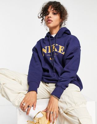Nike Unisex retro athletics fleece hoodie in midnight navy and gold | ASOS