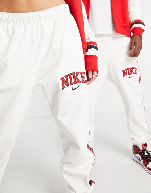 Red and white nike hot sale pants