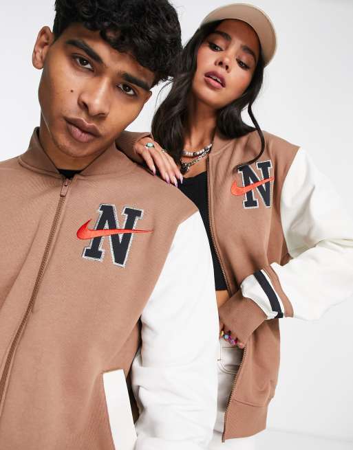 Nike unisex retro collegiate varsity jacket in archaeo brown ASOS