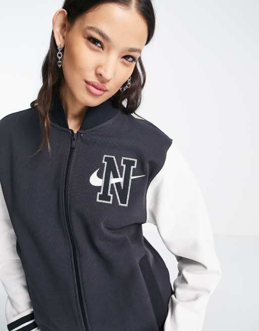 Nike unisex retro collegiate varsity jacket in black and white