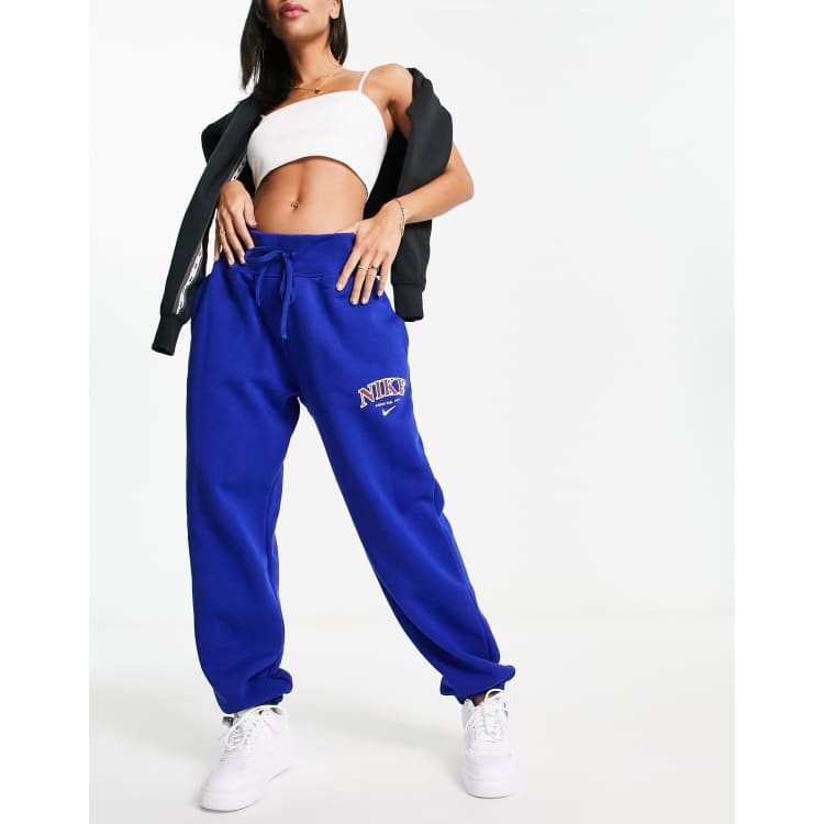 Nike Unisex Varsity phoenix fleece joggers in royal blue