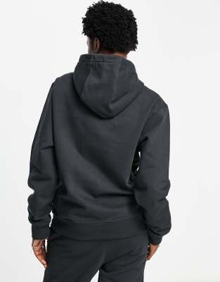 Nike unisex vintage logo fleece oversized hoodie in washed black Clearance
