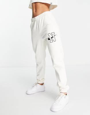 Nike Unisex Vintage logo fleece oversized joggers in off white ASOS