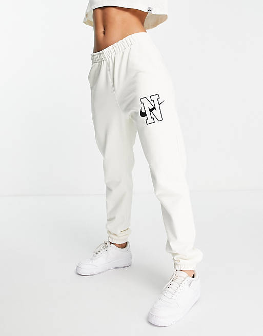 Nike Unisex Vintage logo fleece oversized joggers in off white