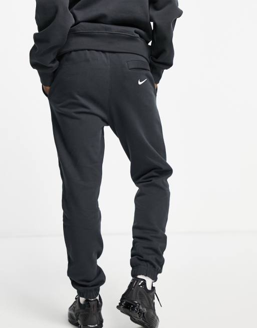 Nike Unisex Vintage logo fleece oversized joggers in washed black