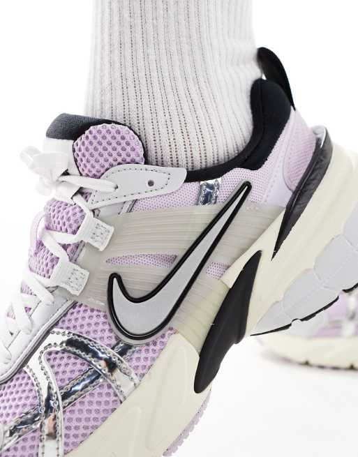 Nike argentate clearance