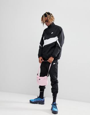 nike vaporwave joggers with large swoosh in pink