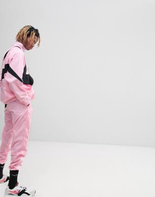 nike vaporwave joggers with large swoosh in pink