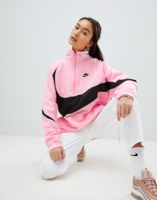 nike vaporwave joggers with large swoosh in pink