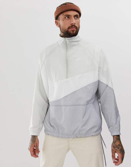 Nike swoosh woven half best sale zip jacket