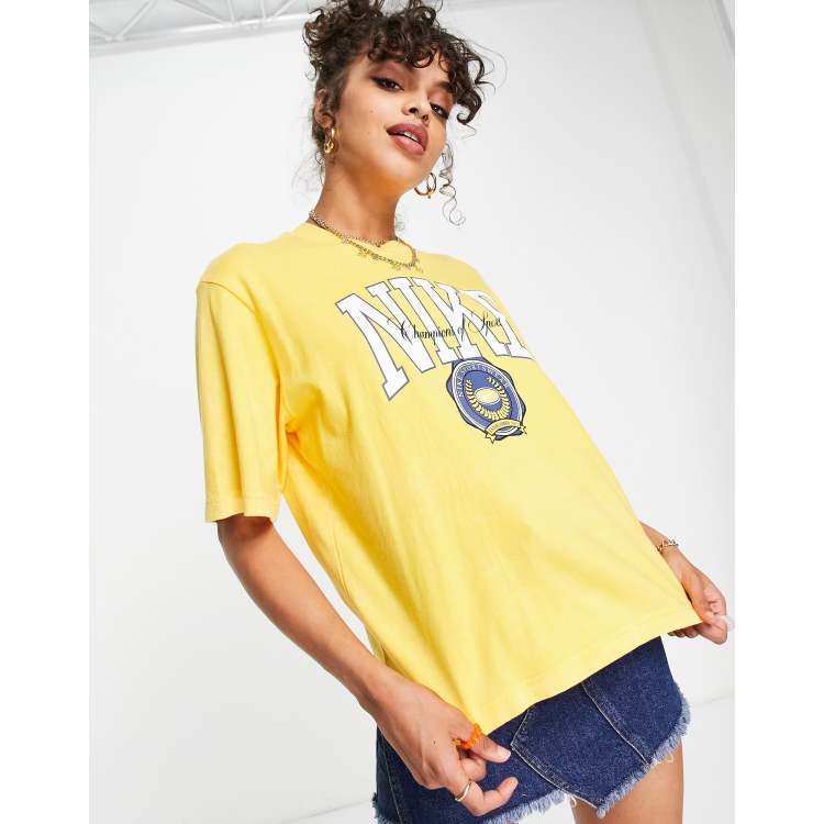 Nike Varsity boxy graphic t shirt in yellow