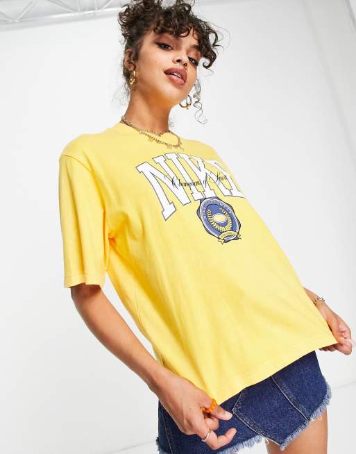 Nike Varsity boxy graphic t-shirt in yellow | ASOS