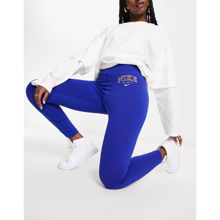 Nike Varsity leggings in royal blue