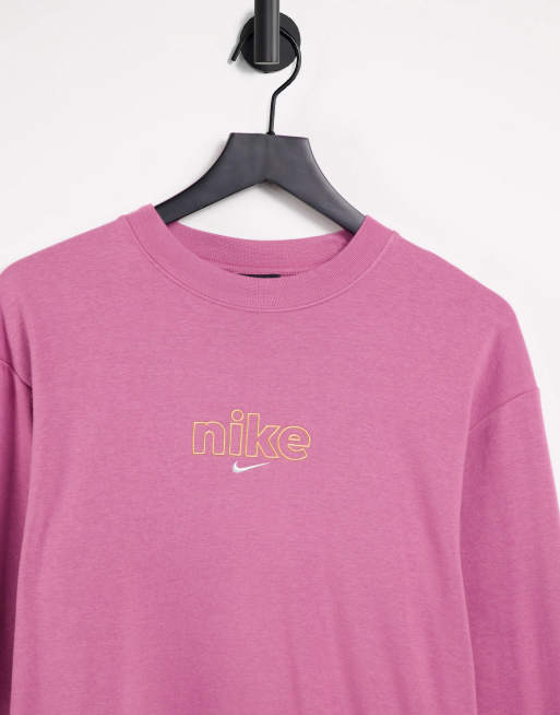 Nike Varsity Pack crewneck sweatshirt in pink | ASOS