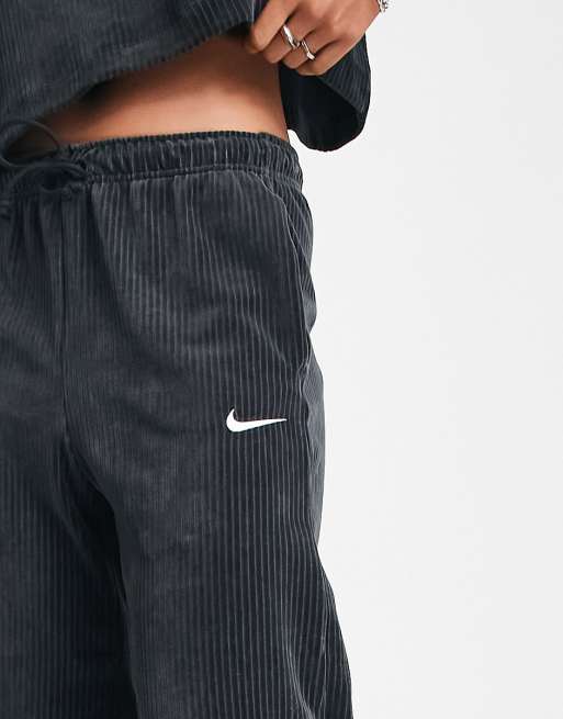 Nike velour cord wide leg joggers in black