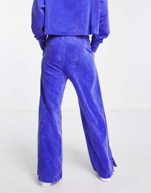 Nike blue velour pants on sale