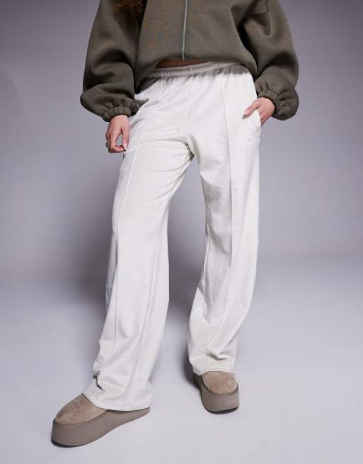 Nike velour straight leg sweatpants in beige ASOS