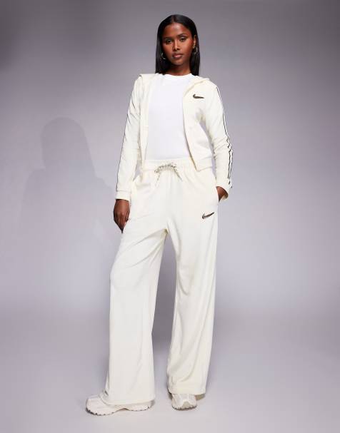 Nike velour wide leg joggers in off white - view 1