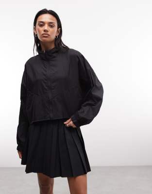 Nike - Veste coupe-vent courte à col cheminée - Noir