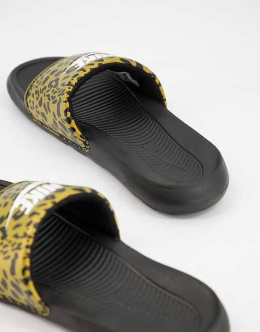 Nike Victori One animal print sliders in black chutney