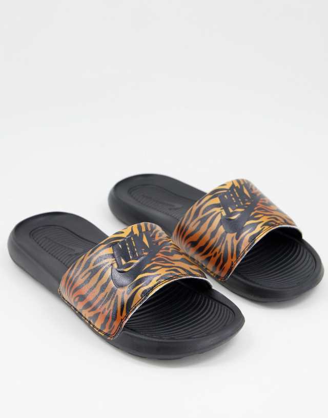 Nike Victori One animal print sliders in black/multi