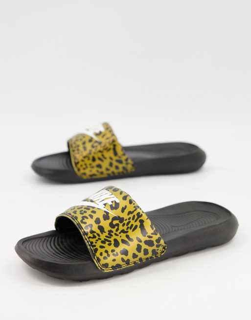 Leopard store nike slides