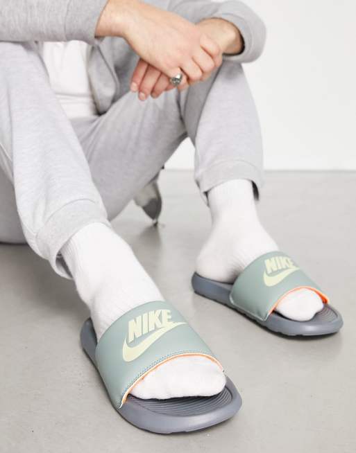 Nike Victori One orange logo slides in green