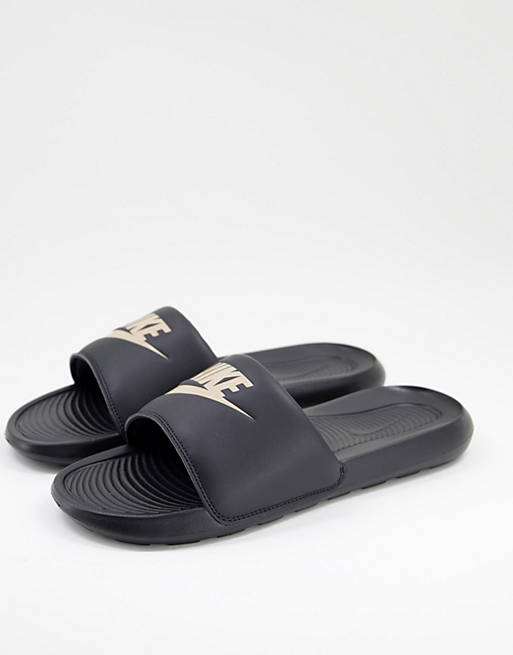 Nike Victori One slider in black and gold