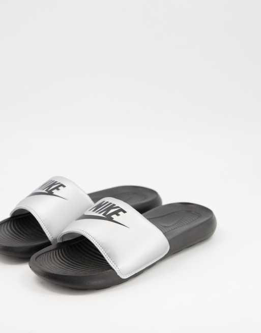 Nike store silver sliders