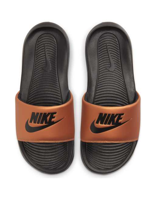 Nike store bronze sliders