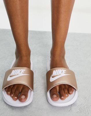 Nike Victori One sliders in rose gold and white