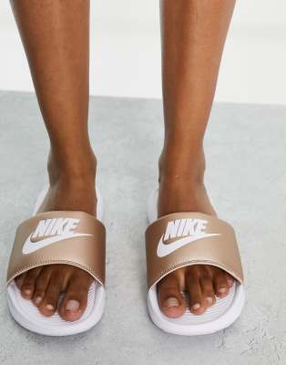 Nike Victori One sliders in rose gold 