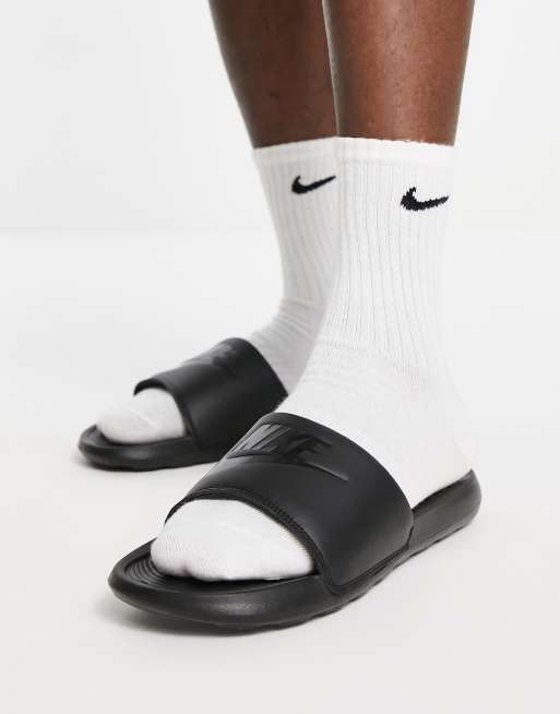 nike victori one sliders in triple black