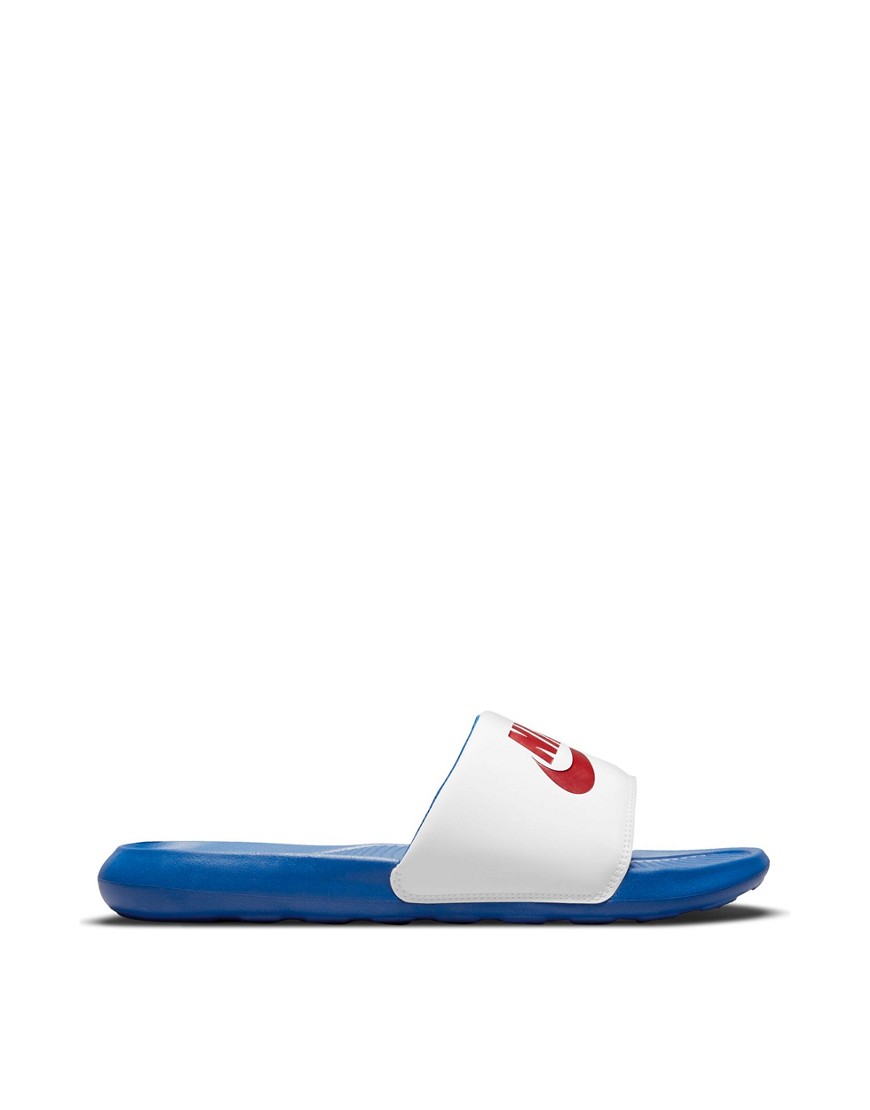 Nike Victori One sliders in white/blue