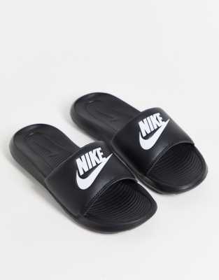 Black and outlet white benassi slides