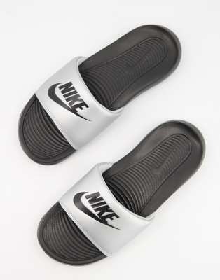 silver nike slides