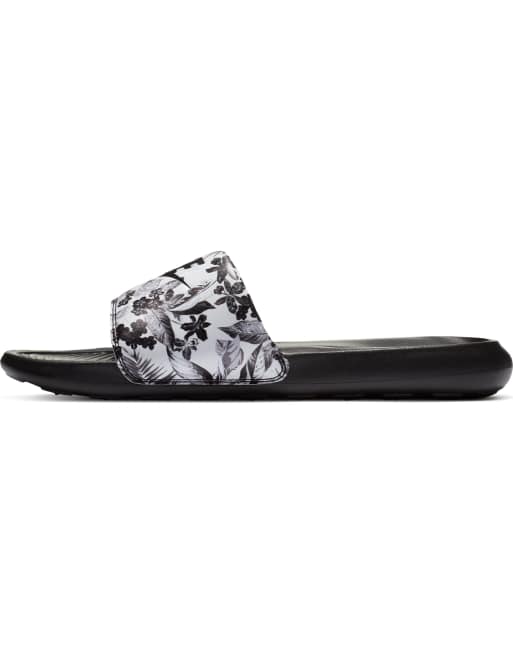 Nike sales slides tropical